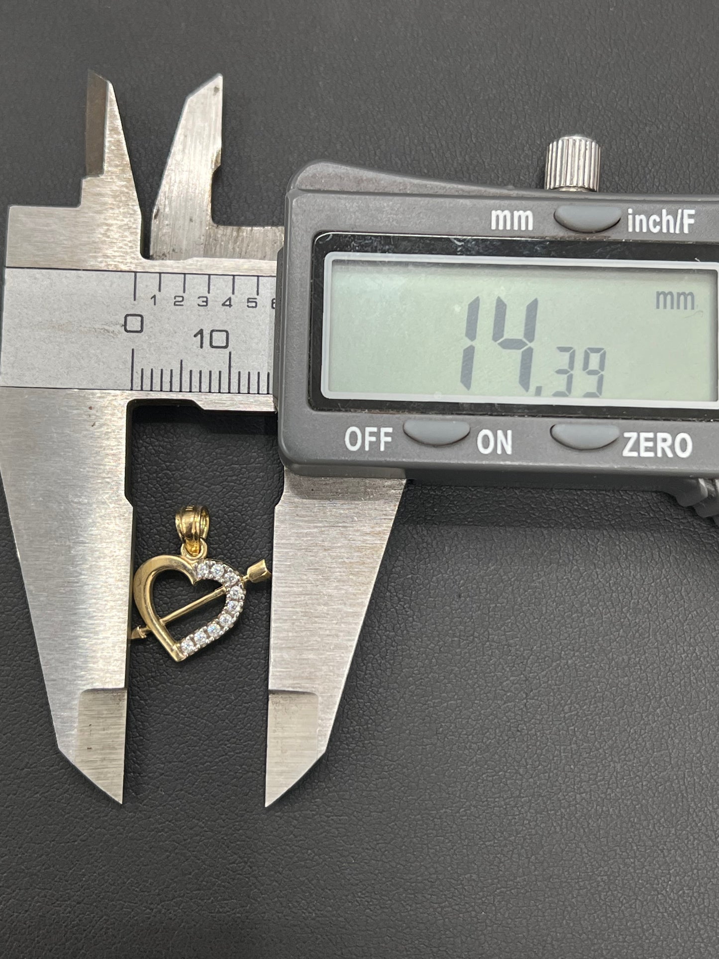 Gold 10k arrow heart pendant Cz